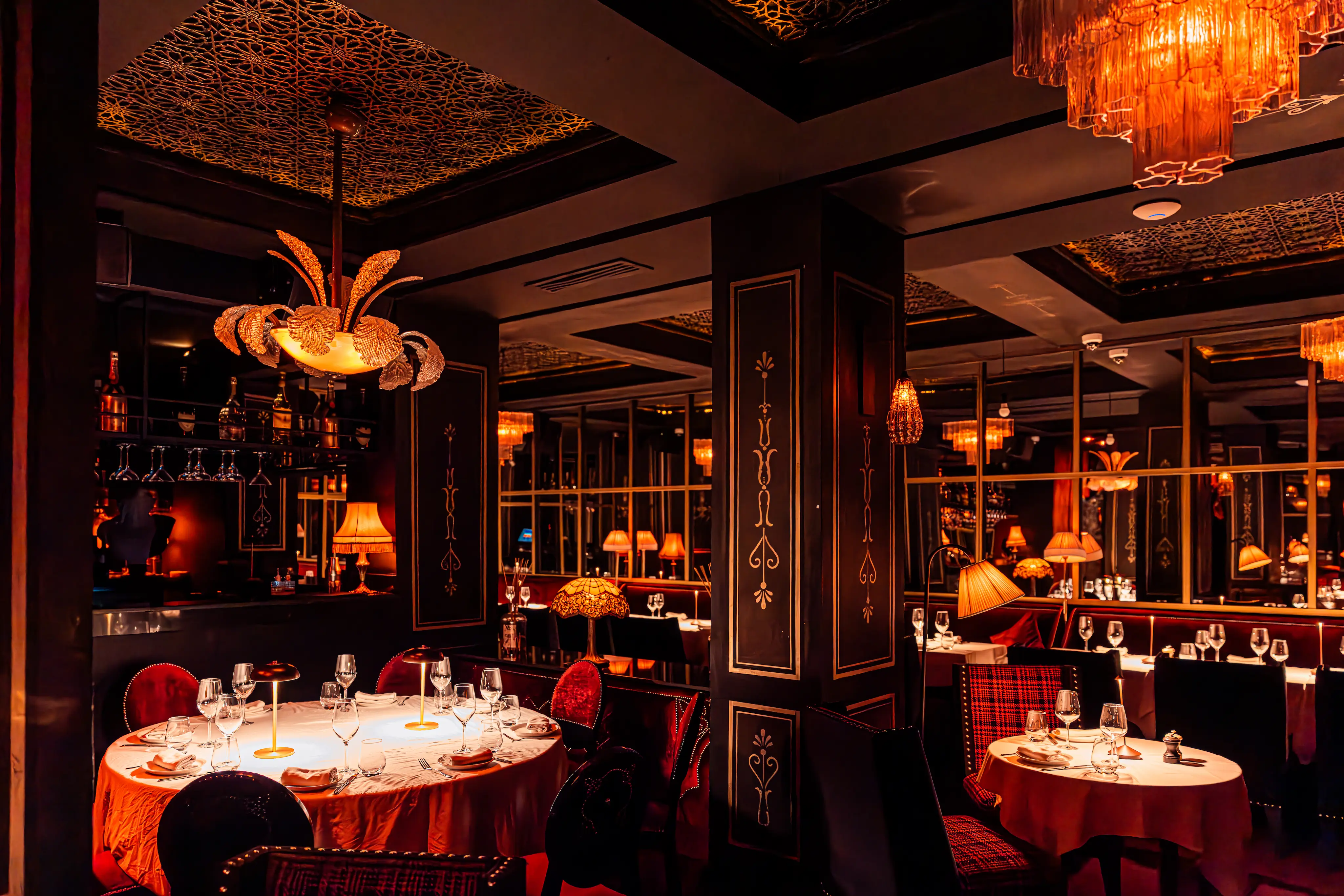 Illuminated exterior facade of Le Palace Marrakech at night